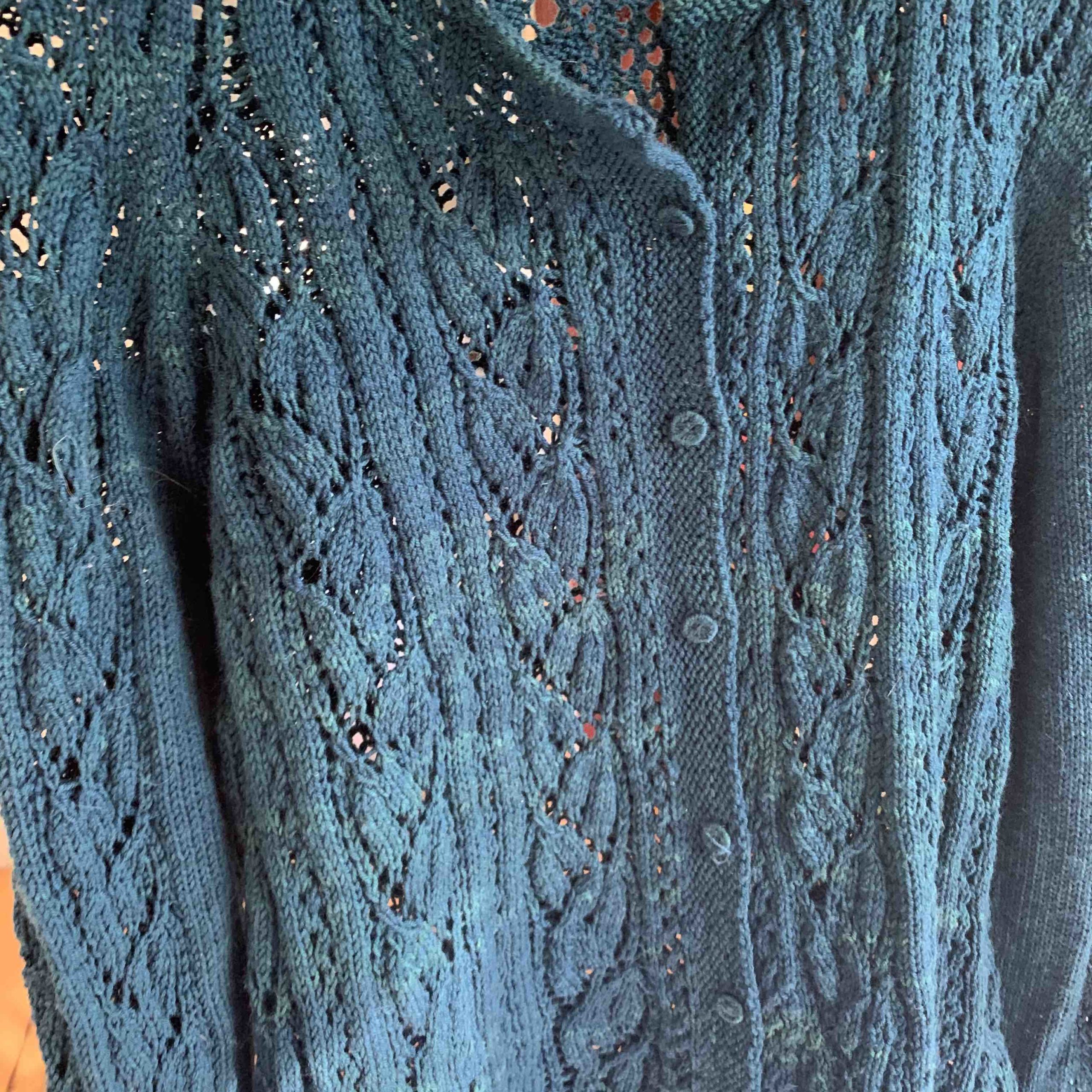 Dorset buttons on a lace cardigan knit by Alanna Nelson