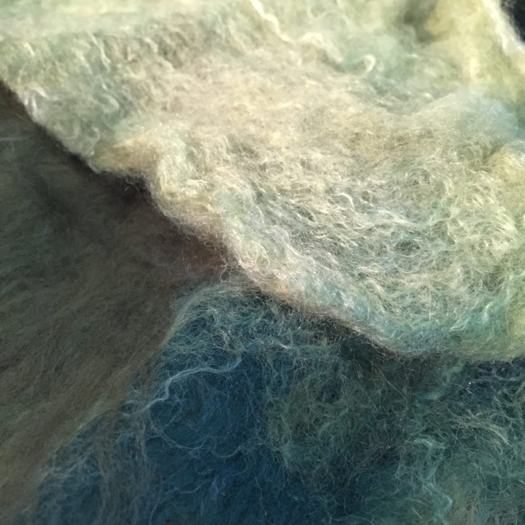 wet felt wool fills Alanna Nelson's Immigration Windows quilt