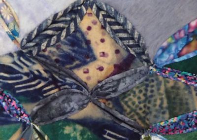 Resist dye wool felt details from "By their hands, we are fed."